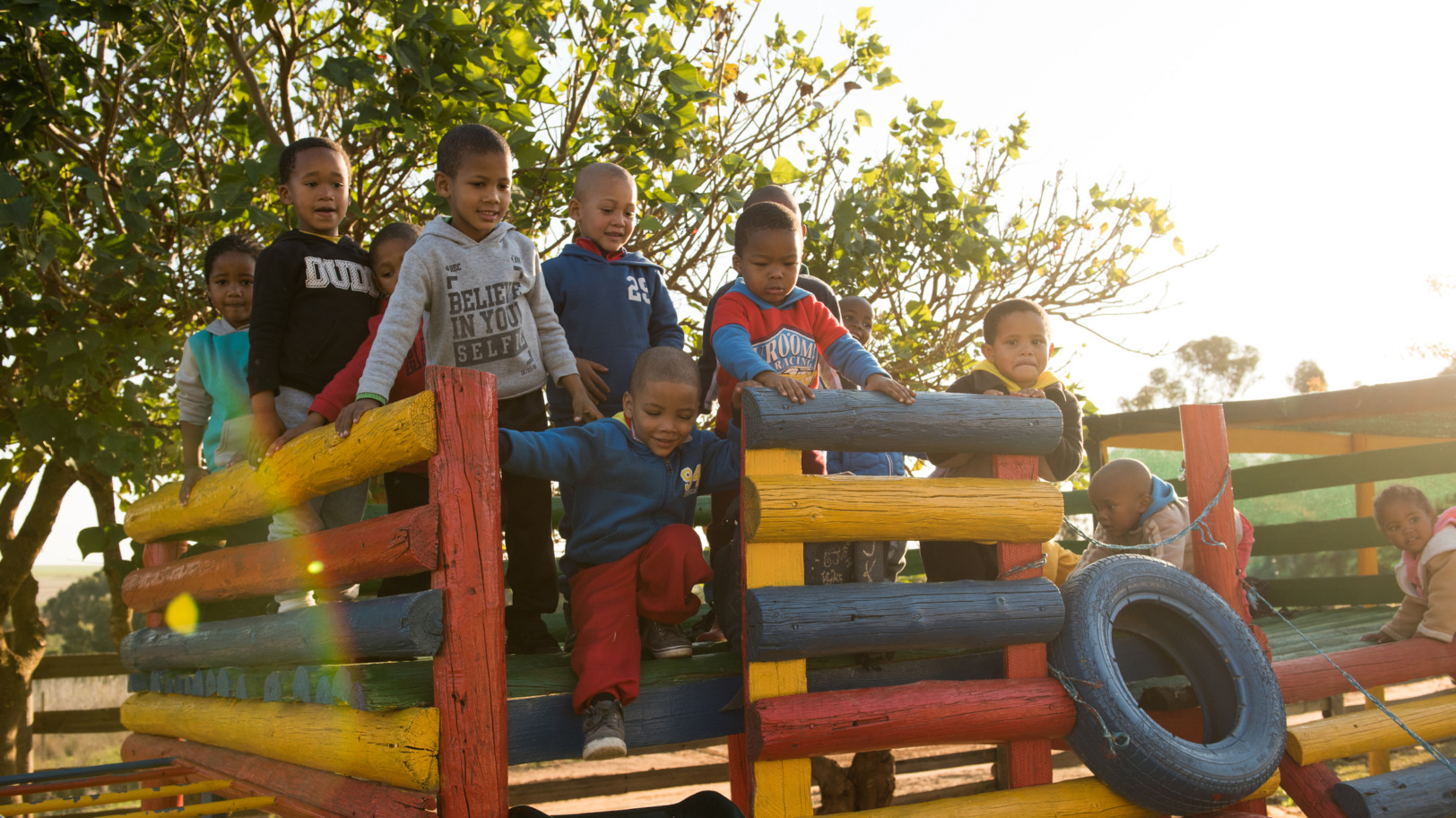 Children engaged in an educational activity, promoting learning and development in a supportive environment.