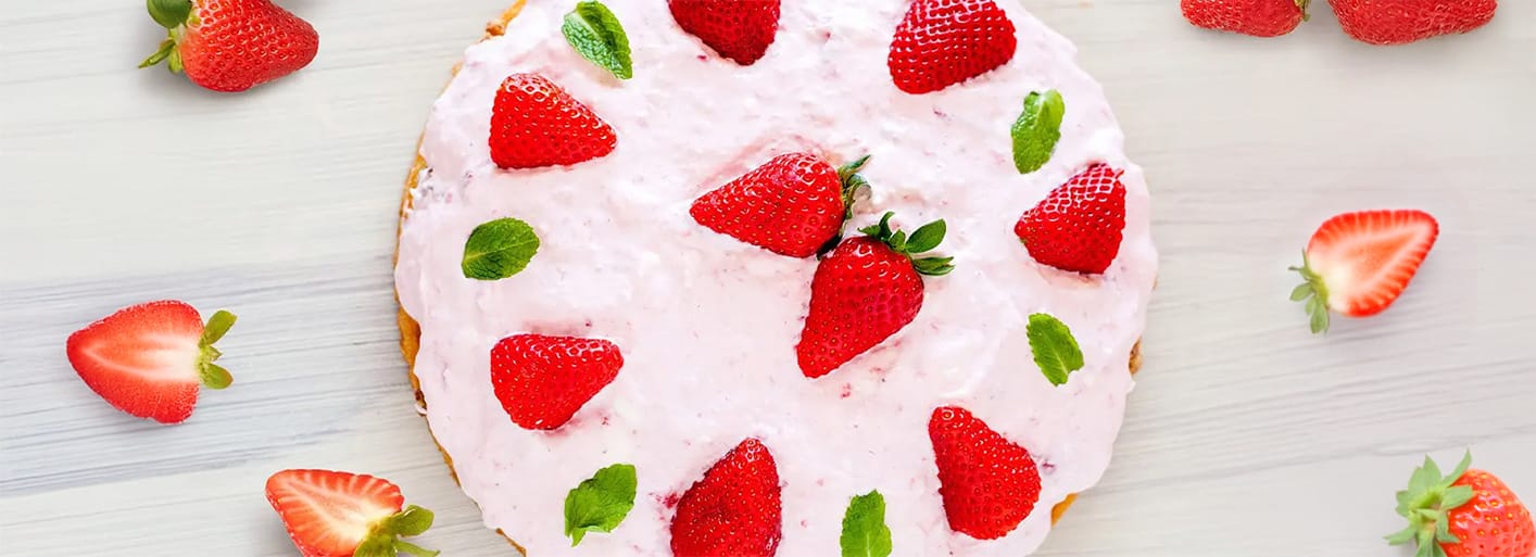 Mother’s Day strawberry cream cake – a beautifully decorated cake with fresh strawberries and whipped cream