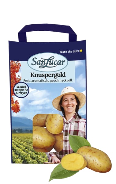 A 1kg package of SanLucar Knuspergold potatoes, featuring a smiling woman in a hat and showcasing the potatoes with the label Specifically suitable for Airfryer.