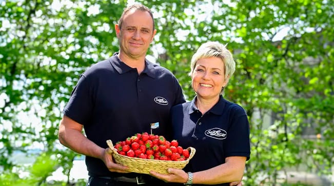 Hensen, a SanLucar farmer, smiling in the fields, dedicated to sustainable agriculture and fresh produce cultivation.