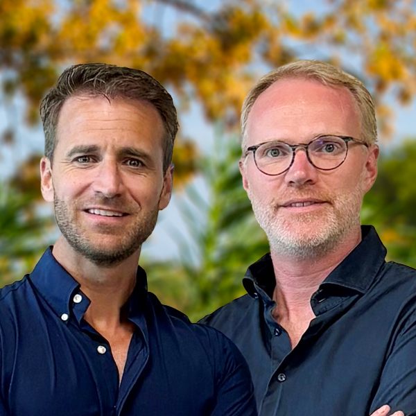 Daan and Joel, SanLucar farmers, standing in the fields and showcasing their commitment to sustainable agriculture.