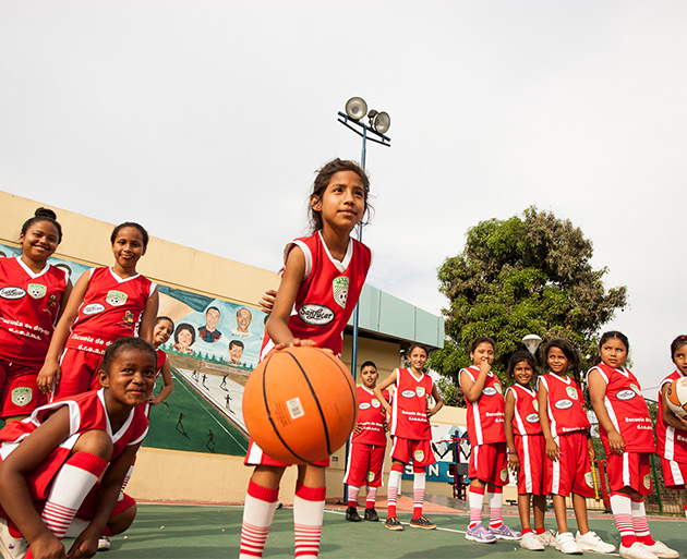Young players enjoying a basketball game, promoting teamwork, sportsmanship, and an active lifestyle.
