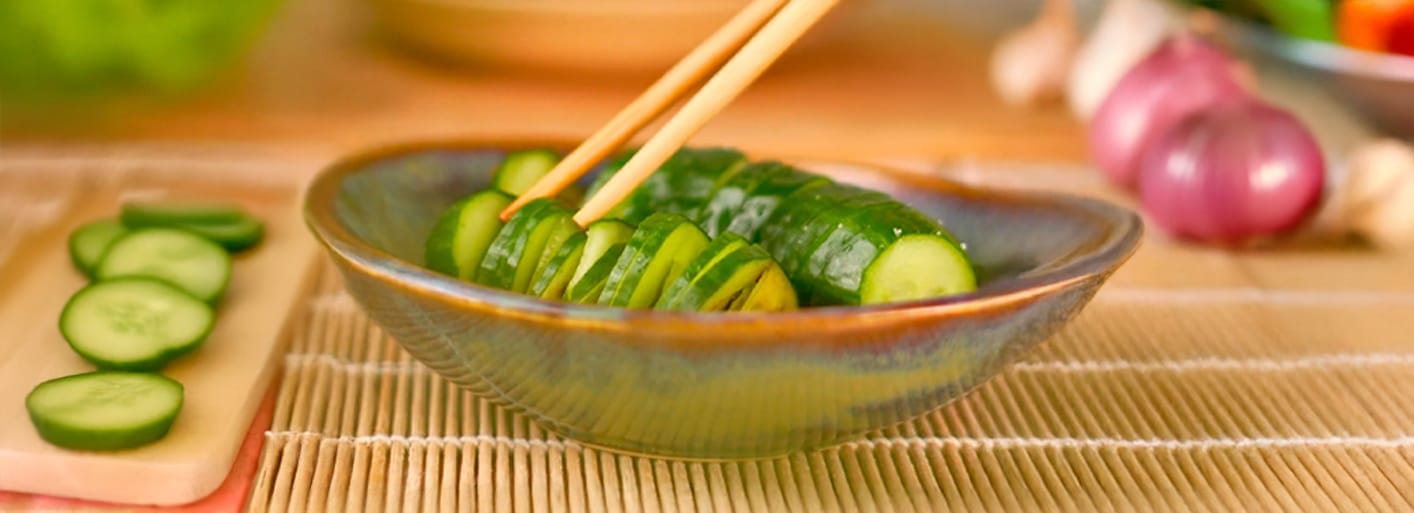 Accordion cucumber salad with fresh cucumbers, herbs, and a light dressing, elegantly arranged for a refreshing dish.