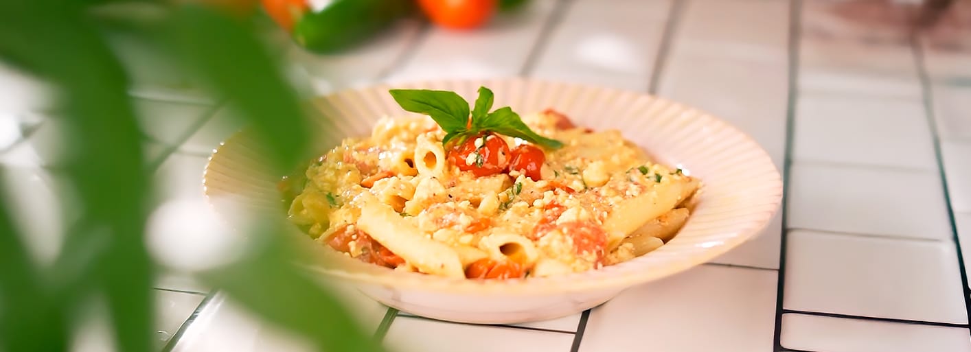 Baked Feta Pasta_header Baked feta pasta with roasted cherry tomatoes and herbs – a creamy and flavorful Mediterranean dish