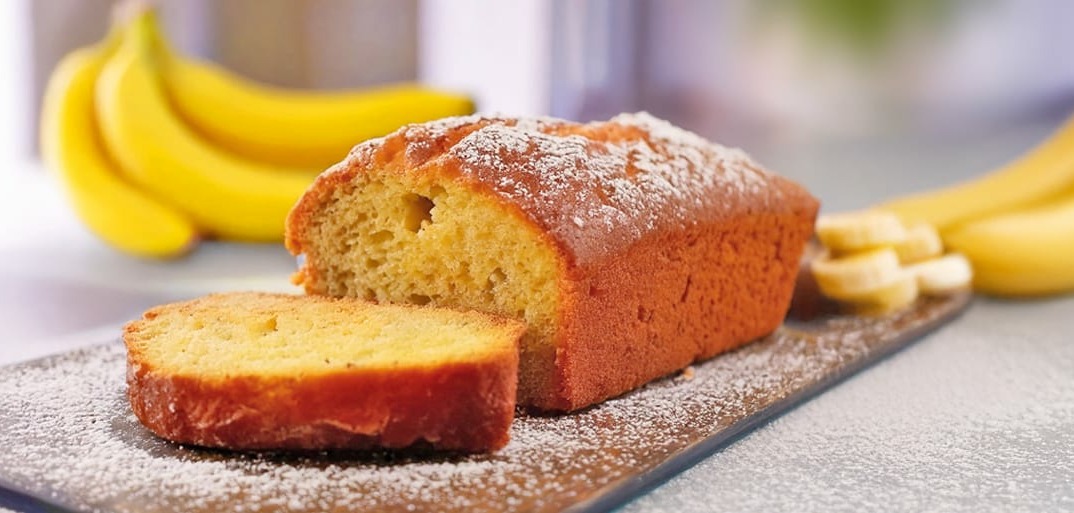 Freshly baked banana bread with a golden crust – a moist and delicious homemade treat